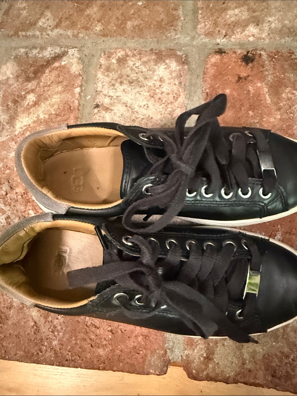 UGG Black Leather Low-Top Sneakers with Tan Lining
